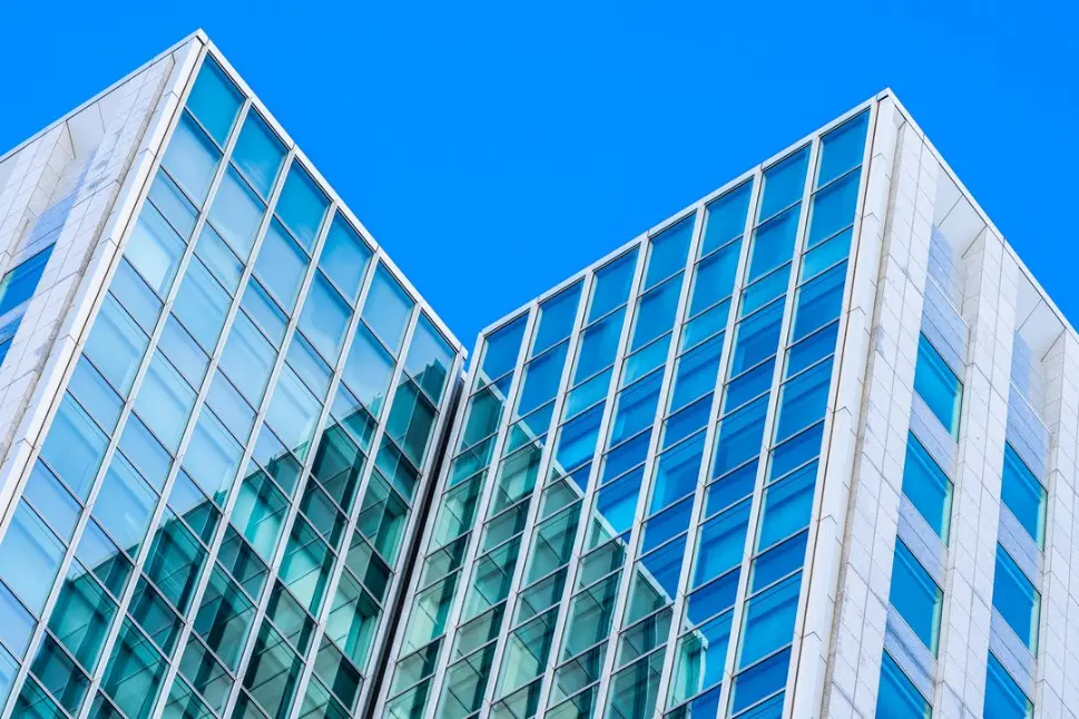 beautiful-architecture-office-business-building-with-glass-window-shape_74190-6437